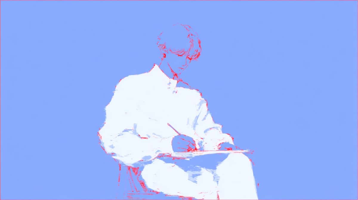ノートに書き込む人の様子