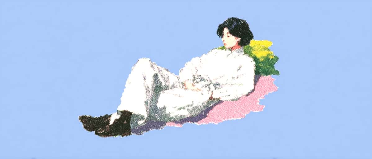くつろいでいる様子の人物。リラックスや休息を連想させる